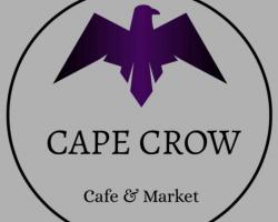 Cape Crow's logo - a purple crow with the text "Cape Crow café & market".