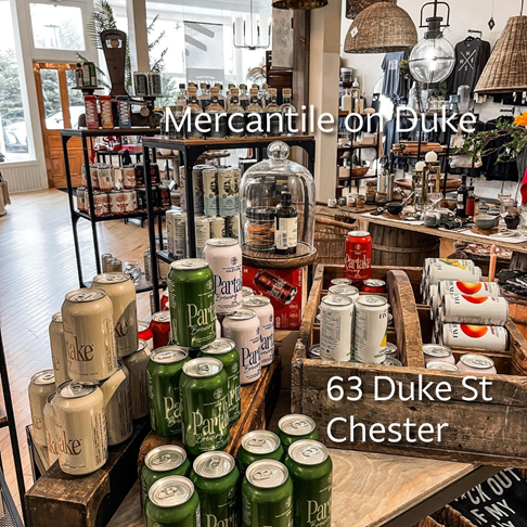 Photo of the inside of Mercantile on Duke showing non-alcoholic beverages, home decor, and clothes
