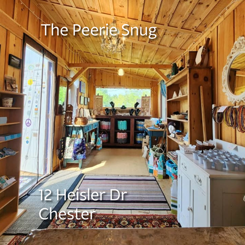 Photo of the artisan goods on shelves along warm wooden walls