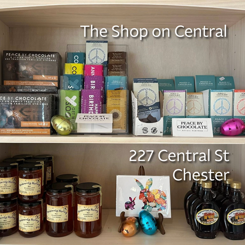Photo of chocolate, honey, and maple syrup on shelves