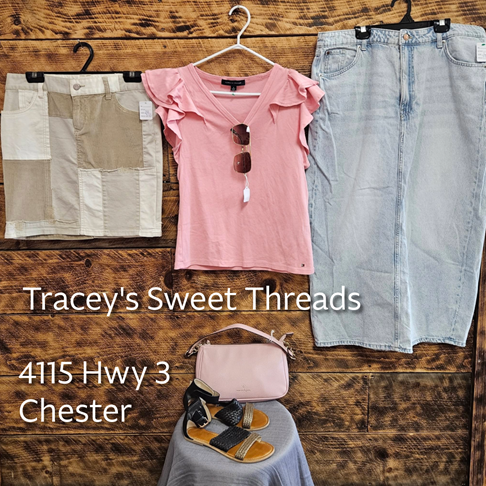 Photo of a skirt, t-shirt, and denim skirts hanging