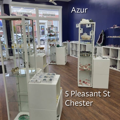 Photo of the inside of Azur with rocks, minerals, and jewellery
