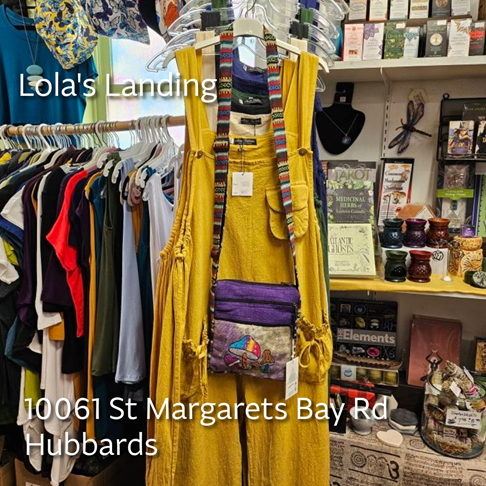 Photo of cloths, bags, candles, and hats at Lola's Landing