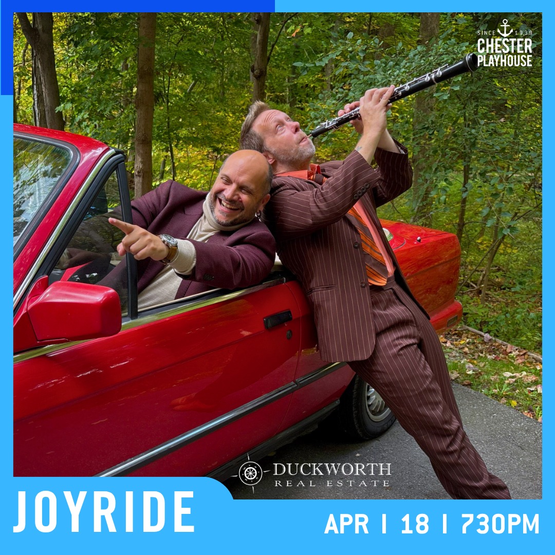 photo of a man playing a clarinet and a man in our car