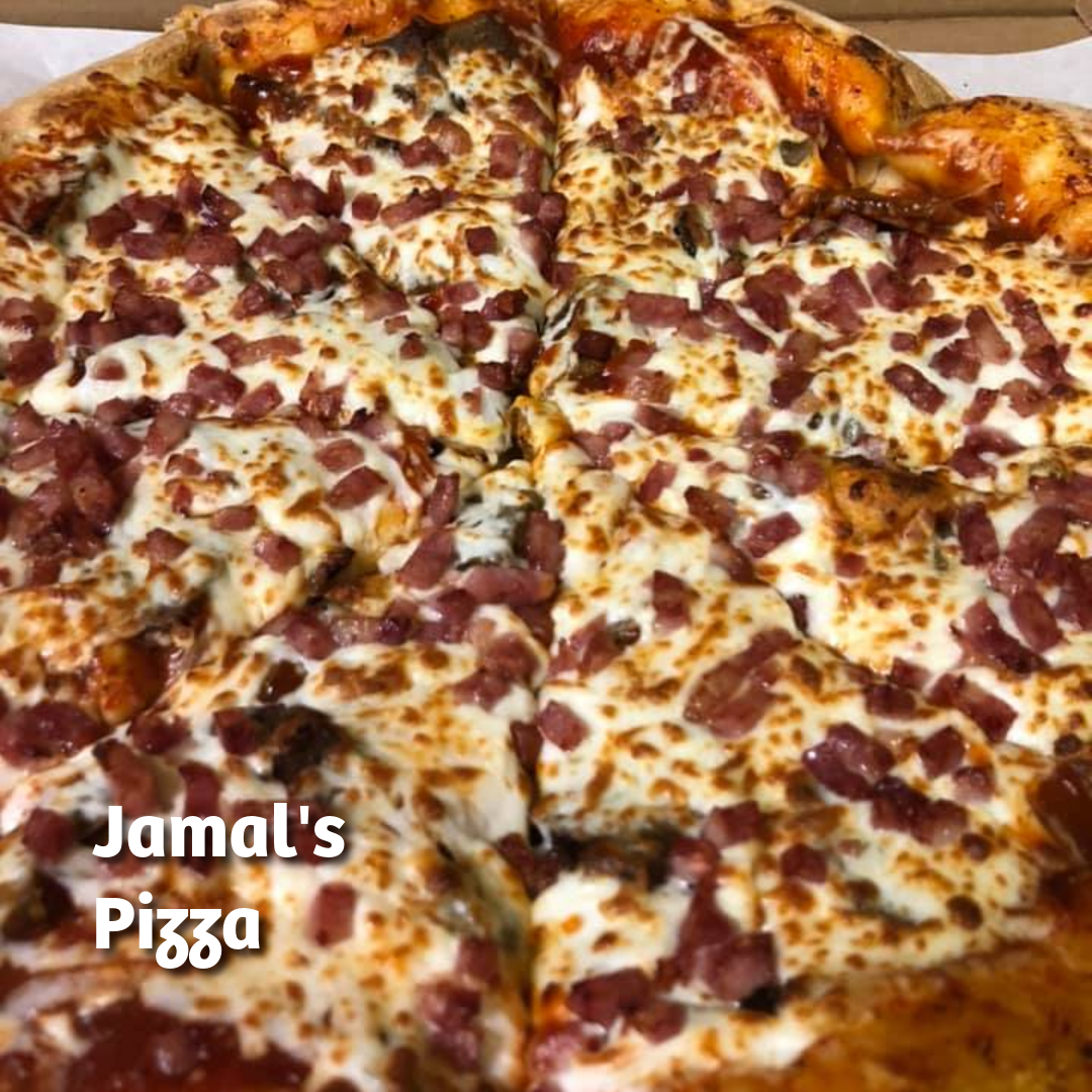 Image shows a pizza covered in cheese and a variety of toppings