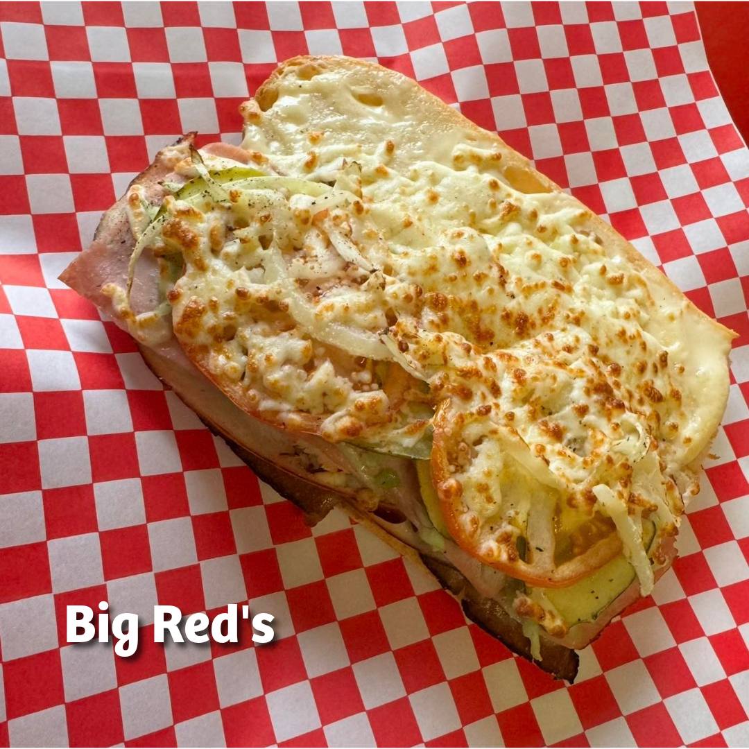 Photo of a sub covered in cheese