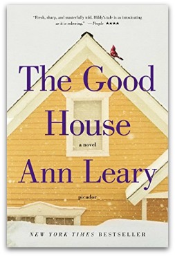 Movie poster of a snow dusted yellow house with purple text reading "The Good House a novel by Ann Leary".