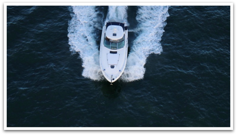 speed boat in dark waters