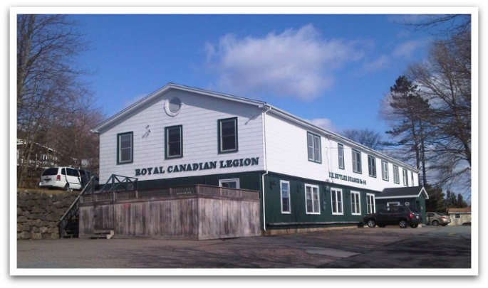 Chester Legion - a long two story white and green building.