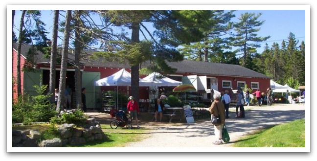 Hubbards barn with farmer's market stalls and people