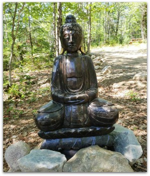 Buddha statue in the woods