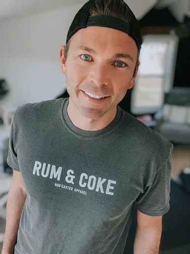 Owner Jay Hiltz wearing a grey noreaster apparel t-shirt