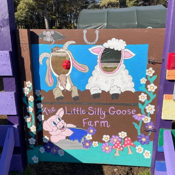 Photo of a photo spot with a goat and sheep cut out.