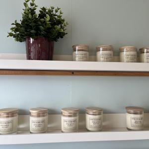 Scented candles on a shelf