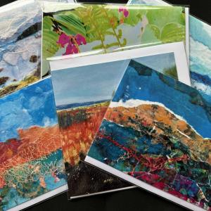 photo of multiple mixed media art cards