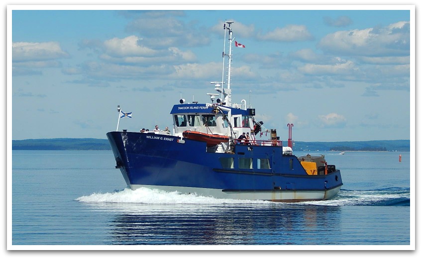 William G. Ernst passenger ferry in transit - a blue boat.